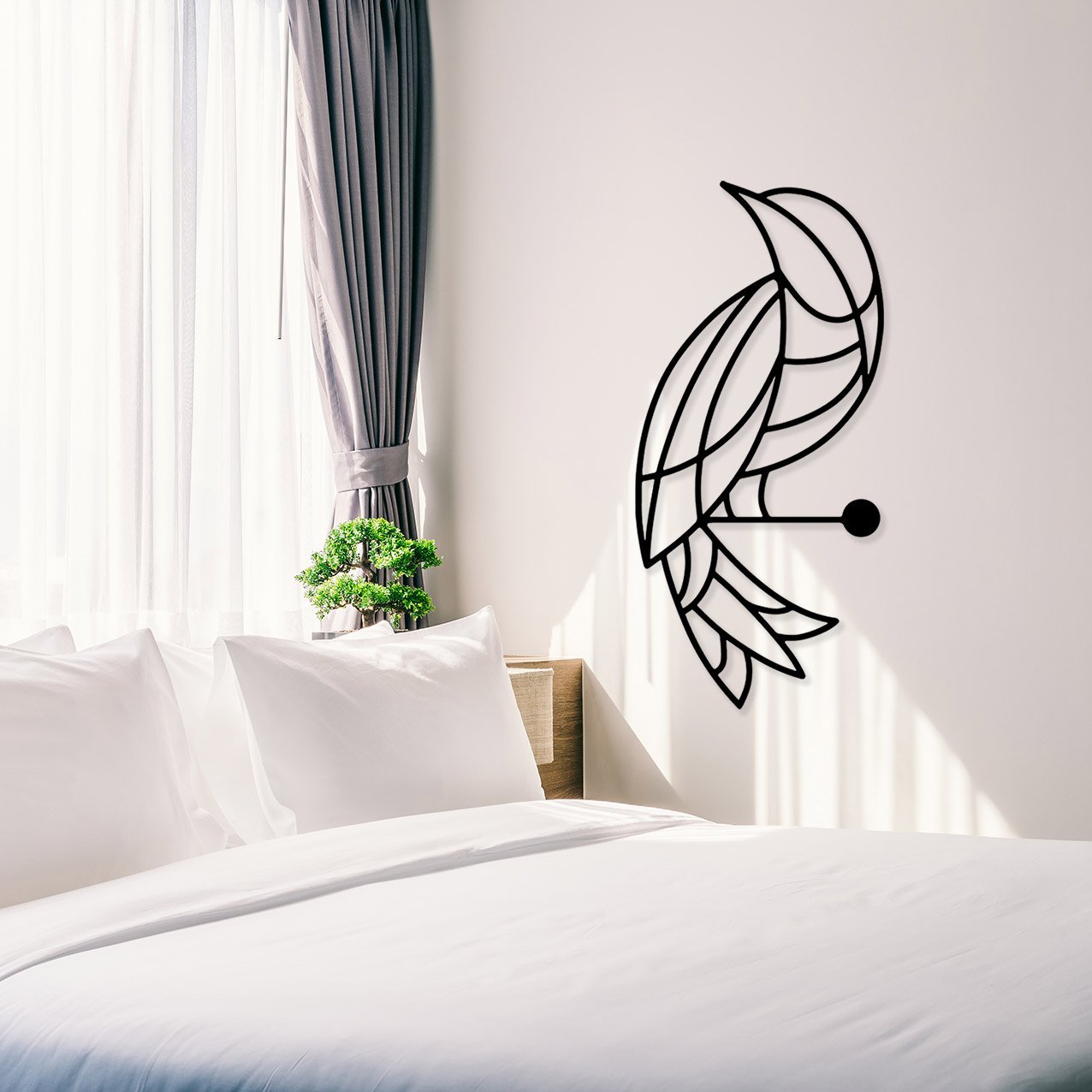 Close-up of white pillow on bed decoration with light lamp and g